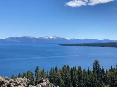 a view of a large body of water with trees at FamilyfunCabin in Tahoma