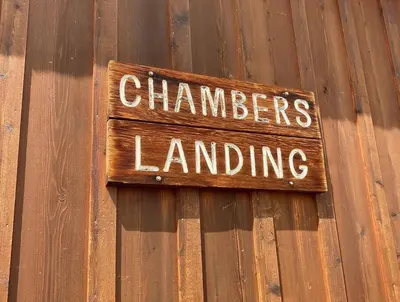 a sign on a building that says chambers landing at FamilyfunCabin in Tahoma