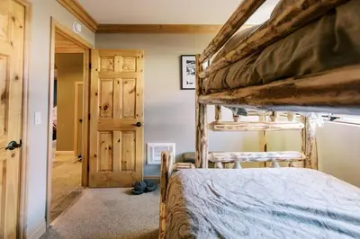 a bedroom with two bunk beds in a room at BEST Location . Walk To Canyon Lodge . Views . Pool/Spa in Mammoth Lakes