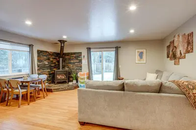 a living room with a couch and a table at Ski and Board in South Lake Tahoe! Updated Home in South Lake Tahoe