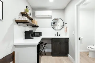 a bathroom with a sink and a mirror at The Rae | Sequoia Motel RM 5 in Three Rivers