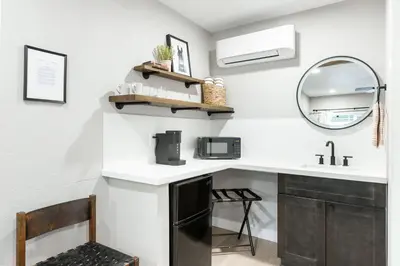 a bathroom with a sink and a mirror at The Rae | Sequoia Motel RM 5 in Three Rivers