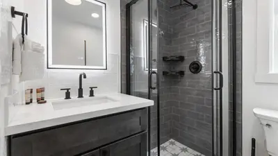 a bathroom with a sink and a shower at The Whitney- Sequoia Motel RM7 in Three Rivers