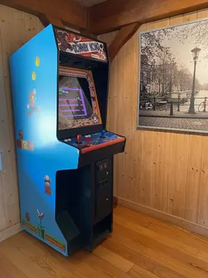 a video game arcade machine in a room at Peaceful & secluded, yet close to town. in Mariposa