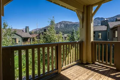 a balcony with a view of the mountains at Lodges 1112 - 3 Bed townhome with Loft in Mammoth Lakes