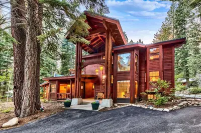 a large wooden house in the woods at Donner Lake Inn in Truckee