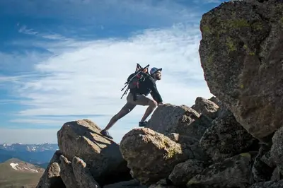 a person standing on top of a rocky mountain at Studio with Incredible Location in Tahoe City in Tahoe City
