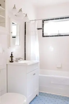 a white bathroom with a sink and a bath tub at Oasis East Sac Charming Home with Saltwater Pool and Casita in Sacramento