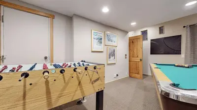 a game room with a pool table in it at Val D'Isere #8 condo in Mammoth Lakes