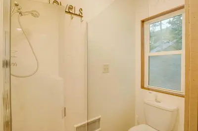 a bathroom with a shower and a toilet at Mountain Condo with Fireplace in Kirkwood Ski Resort in Kirkwood