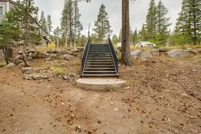 a set of stairs leading up to a house at Mountain Condo with Fireplace in Kirkwood Ski Resort in Kirkwood
