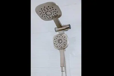 a shower head sitting on top of a white towel at Entire Villa in Sierra Mountains in Alta