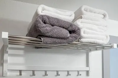 a towel rack with towels on top of it at Newly Built Luxury Villa in the Sierra Mountains in Alta