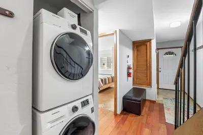 a washer and dryer hanging on a wall at Alpine Escape: Tahoe Oasis Steps from Lake in Carnelian Bay