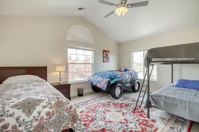 a bedroom with a bed with a car on it at 4 Mi to Downtown Reno Family Retreat with Fireplace in Reno