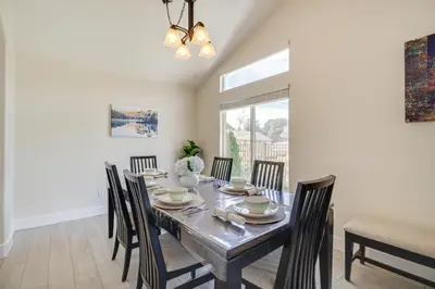a dining room with a table and chairs at 4 Mi to Downtown Reno Family Retreat with Fireplace in Reno