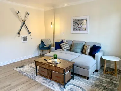 a living room with a couch and a table at Moose and Maple Lodge in South Lake Tahoe