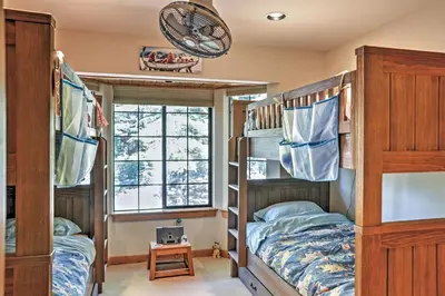 a bedroom with bunk beds and a window at Truckee Northstar Family Home by Jaeger Retreat in Truckee