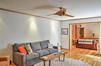 a living room with a couch and a ceiling fan at Truckee Northstar Family Home by Jaeger Retreat in Truckee