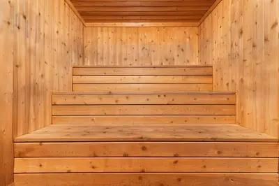 a wooden sauna with wooden steps in a wooden wall at Epic Condo walk to Canyon Lodge in Mammoth Lakes