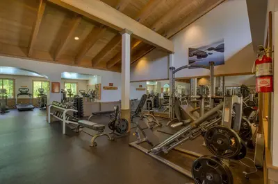 a gym with lots of equipment in a room at Basque Lodge at Northstar by Tahoe Getaways - Pet-Friendly 5BR w Free Shuttle & HOA Amenities in Truckee