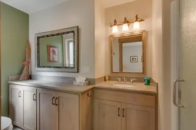 a bathroom with a sink and a mirror at High Sierra at Dollar Point - Private Hot Tub, Close to Ski Resorts, Pet Friendly! in Tahoe City