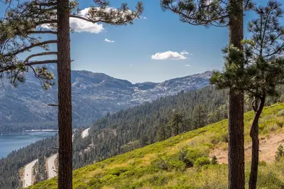 a view of the columbia river from a hill with trees at Overlook Lake View Lodge by Tahoe Getaways- Dog Friendly, HOA, Sauna, Hot Tub, Views of Donner Lake in Truckee