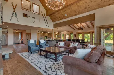 a large living room with couches and a table at Highland Estate at Old Greenwood - Large, Luxury, Private Hot Tub & Amenity Access in Truckee