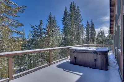 a heater on a balcony with snow on it at Above the Pines - Hot Tub- Pet Friendly -Gym and Pool Access in Truckee