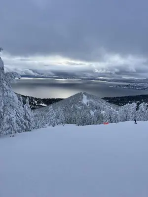 a view from the top of a snow covered mountain at 1 Sky Lake - walk to town in Incline Village
