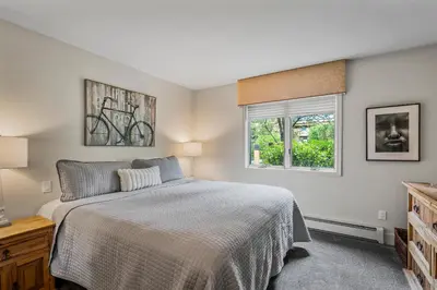 a bedroom with a bed and a window at 153 McCloud The perfect location! Enjoy the sun drenched deck in Incline Village