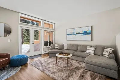 a living room with a couch and a table at 147 McCloud - The Perfect McCloud Getaway in Incline Village