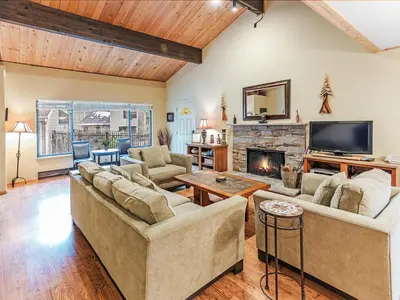 a living room with two couches and a fireplace at 168 Forest Pines - walk to Lakeshore Blvd community pool and hot tub in Incline Village