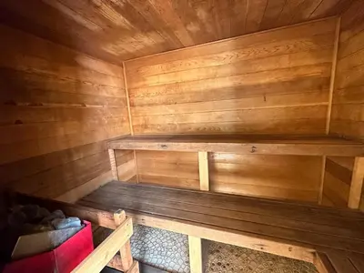 a wooden sauna with a wooden bench in it at New renovated McCloud Condo in the middle of Town in Incline Village