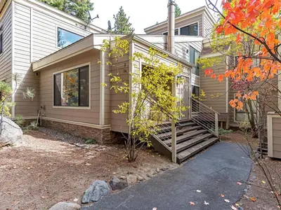 a house with a staircase leading to the front door at 214 Forest Pines Nicely Decorated 4 Bedroom Condo in Incline Village
