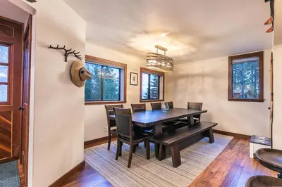 a dining room with a table and chairs at Lake of the Sky at Dollar Point - Stunning 4BR,4BA w Lake Views, Hot Tub and Pet-friendly in Tahoe City