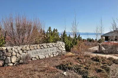 a stone wall with a sign that says california bar at Rooney Ridge - Luxury 2600 Sq Ft, Cozy Fireplace, Family Room, Ping Pong Table! in Carnelian Bay