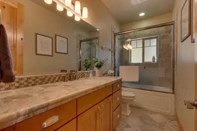 a bathroom with a sink and a shower and a toilet at Paradise in the Pines - Luxury Home in Quite Neighborhood, Wooded Views, Short Drive to Skiing in Carnelian Bay