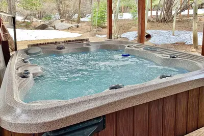 a large bath tub filled with blue water at Hawk's Peak at Tahoe Donner in Truckee