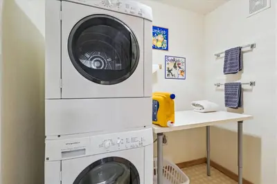 a washing machine and a dryer in a room at Rocky Point # 4 - 2 BR Northstar Condo, Shuttle to Slopes, HOA Amenities! in Truckee