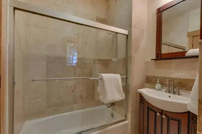 a bathroom with a shower and a sink at Starlight Retreat at Gray's Crossing in Truckee