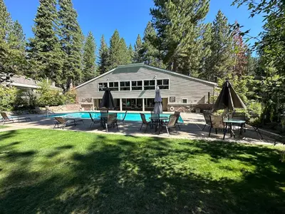 a house with a swimming pool in the yard at 223 Forest Pines short walk to bike path and the Hyatt Casino in Incline Village