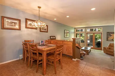 a dining room with a table and chairs at 226 McCloud great location in Incline Village