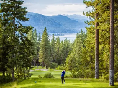 a man is playing golf on a golf course at Incline Village Championship Golf Coarse Retreat in Incline Village