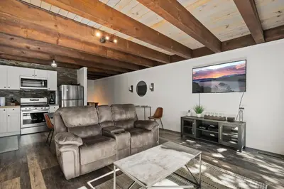 a living room with a couch and a table at Incline Village Championship Golf Coarse Retreat in Incline Village
