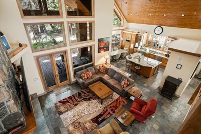 an overhead view of a living room and dining room at Spectacular low elevation home at its finest! in Incline Village