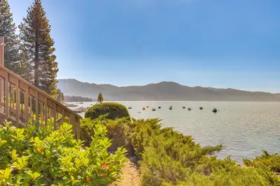 a lake with a bunch of boats in the water at Lake Tahoe Gem with Furnished Deck and Water Views! in Incline Village