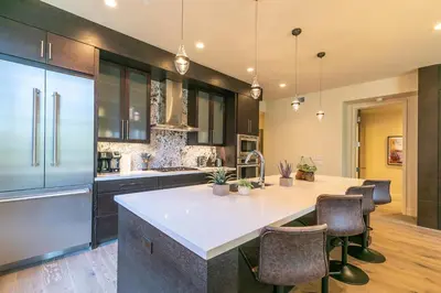 a kitchen with a large white island in a kitchen at Crystal Bay Retreat 204 in Crystal Bay