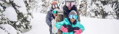 two people are standing in the snow with their snowboards at VIP Lakefront Condo Amazing Views Pool Pickleball Excellent Location Balcony BBQ in Kings Beach