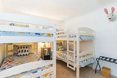 a room with two bunk beds and a bed at The perfect getaway for a small group or families in Incline Village